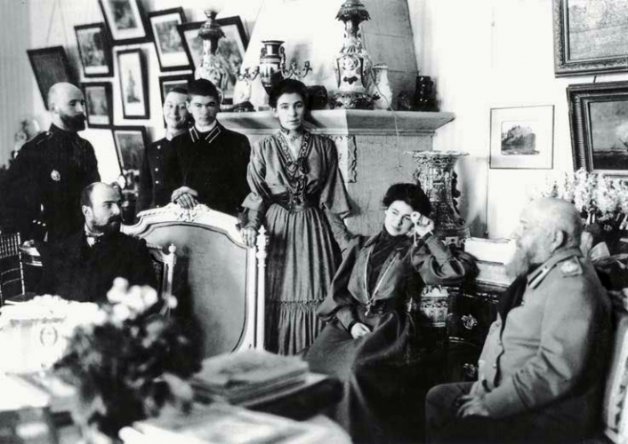In the Olsufievs' house on the Fontanka, Petersburg. Sitting (from left to right) Yu.A. Olsufiev, L.V. Glebov and A.V. Olsufiev. Standing (from left to right) P.I. Neradovsky, Vladimir and Vasily Komarovsky, S.V. Olsufiev. 1904